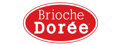 Le logo de la Brioche Dorée se caractérise par un texte blanc sur un fond ovale rouge, avec