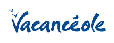 Logo Vacancéole bleu en lettres cursives avec deux silhouettes d'oiseaux au-dessus de la lettre